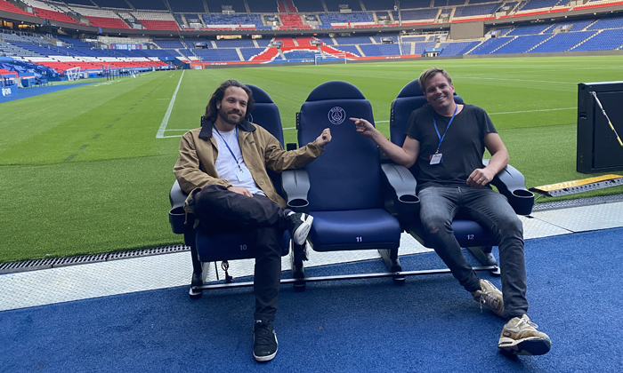 Jorg Rijkschroeff and Jeroen Diks from Sit & Heat on seats with their heating system in the Paris Saint-Germain stadium.<br />Image: Sit & Heat